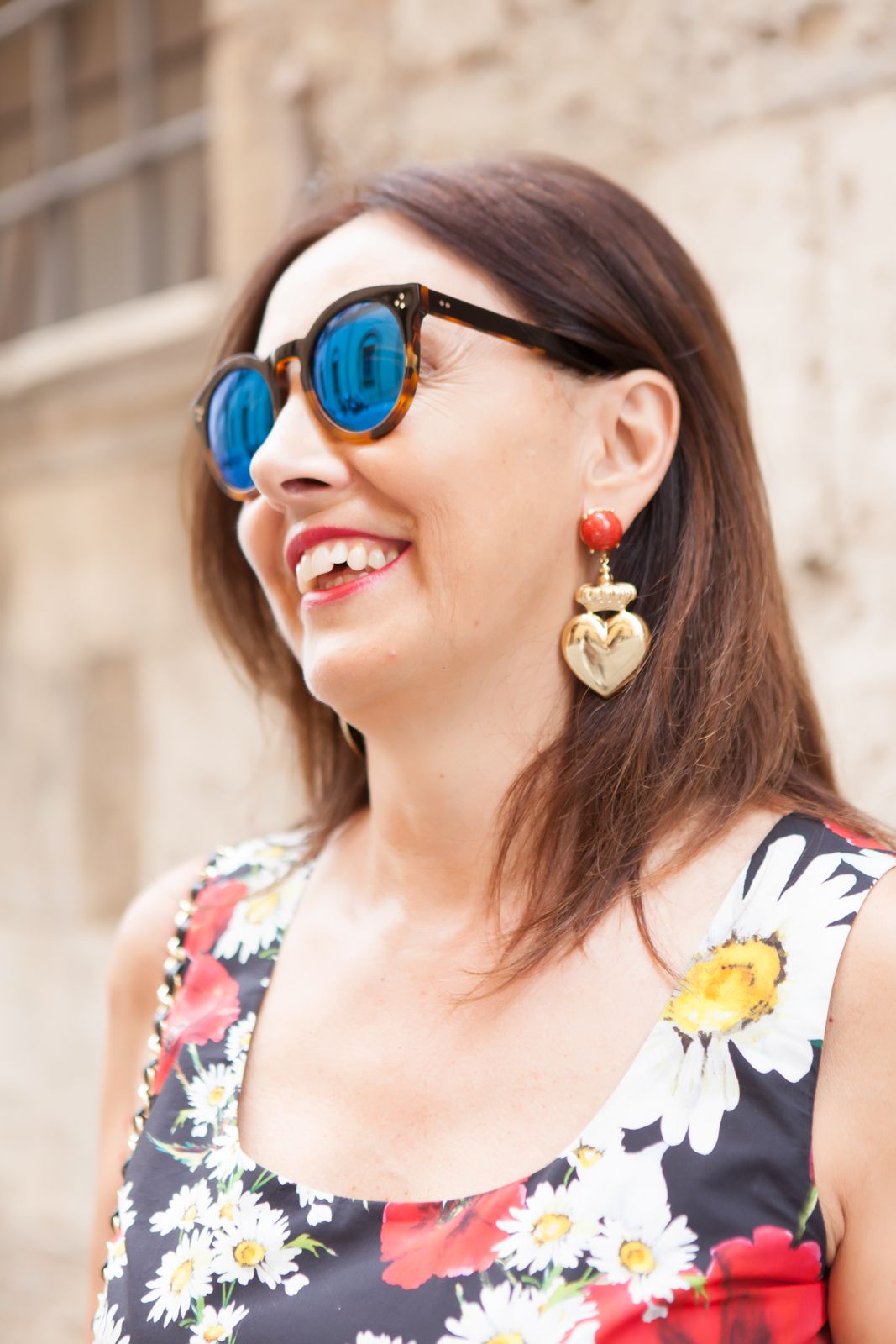 My dress is a flower garden - illesteva sunglasses, dolce gabbana flower dress, amle earrings, marni sandals. photo shooting in Siena - Not Only Twenty Fashion blog